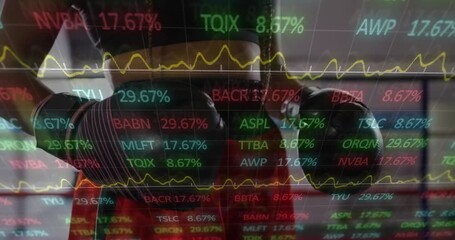 Female boxer entering gym rhythm as stock ticker overlay fluctuating driving glove strike intensity - Powered by Adobe