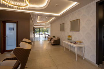 Modern hotel lobby interior with ceiling lights