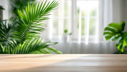 Fototapeta premium Empty light wooden table in front of a window with lush green plants and sheer curtains.