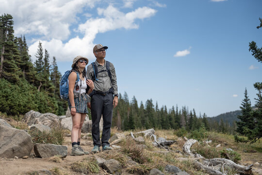 Father and Daughter admiring the landscape while hiking