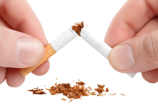Breaking free from addiction, hands snap cigarette in powerful quitting gesture