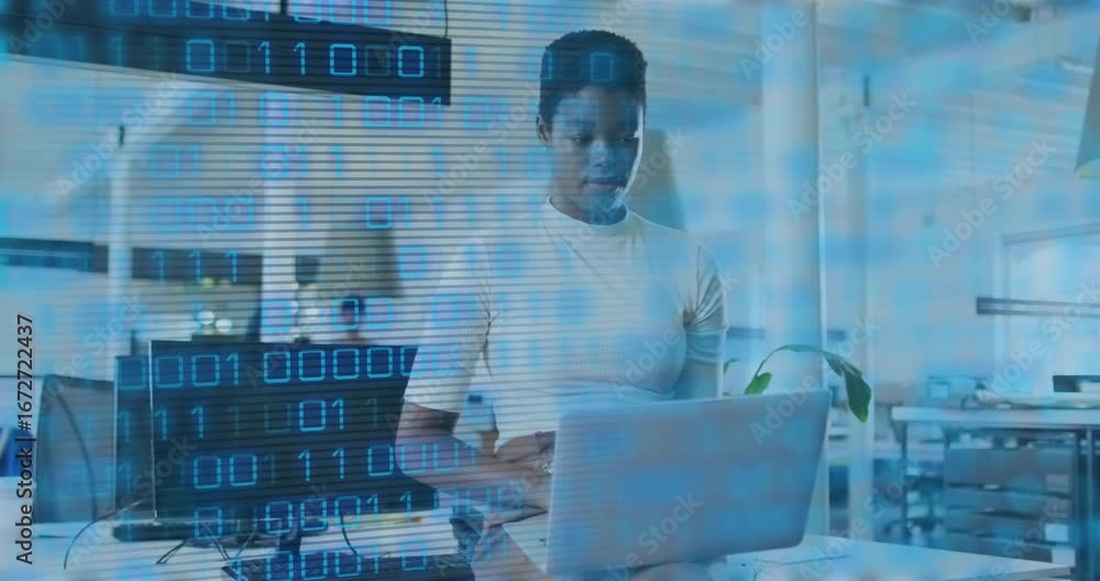 Poster developer opening laptop and typing code in office, causing binary overlay scrolling across frame