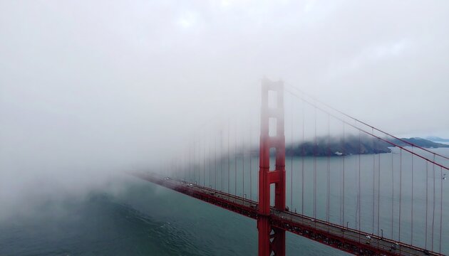 Golden Gate Bridge shrouded in fog a classic San Francisco view.