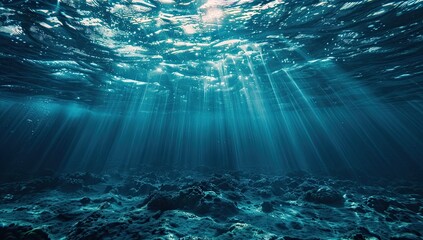 Obraz premium Underwater Sunlight Beams Ocean Floor Rocks Background Scuba Diving