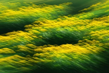 Abstract field of vibrant yellow and green flowers, blurred motion