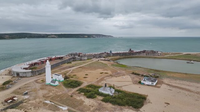 Hurst Point Lighthouse and Hurst Castle from drone over Hurst Spit, Milford on Sea, Lymington, Hampshire, England