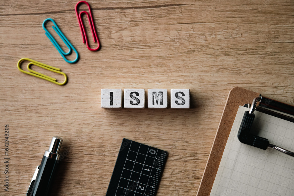 Poster there is wood cube with the word isms. it is an abbreviation for information security management sys