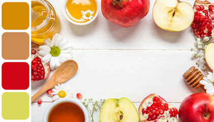 Frame made of fruits, flowers and honey on white wooden background, closeup. Rosh hashanah (Jewish New Year) celebration