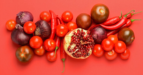 Assortment of fresh vegetables on color background