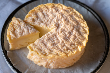 French soft Camembert cheese, original Camembert de Normandie made from raw unpasteurised cow milk