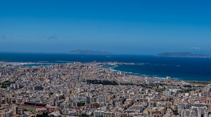 View from heights of Erice to scenic coastal roads, Trapani’s salt pans and olive groves,...