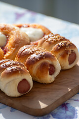 Fresh baked bread, pizza, focaccia or pizzetta with tomatoes, vegetables, sausage and cheese, street food in Palermo, Sicily, Italy, served outdoor for lunch