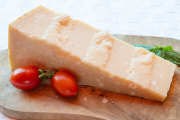 Italian food - 36 months aged in caves Italian parmesan hard cheese from Parmigiano-Reggiano, Italy