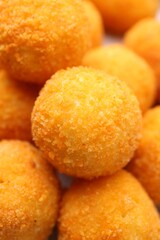 Delicious fried croquette balls as background, closeup