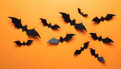 Fototapeta premium halloween and decoration concept - paper bats flying