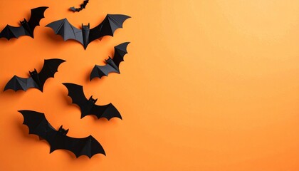 Fototapeta premium halloween and decoration concept - paper bats flying