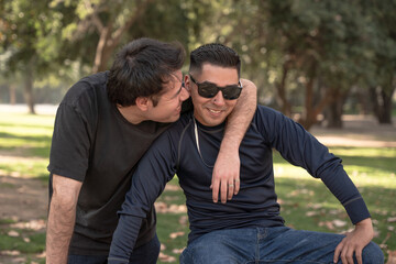 Two Men Laughing on a Park Bench, Outdoors