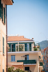 Vibrant photos of Cinque Terre featuring Italian beaches, boats on the Mediterranean, bikini lifestyle, coastal towns, colorful villages, and summer vacations