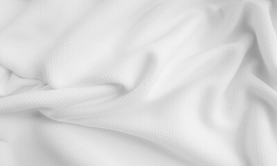 White crumpled fabric background. Wavy cloth texture