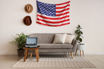 Interior of living room with USA flag, sofa and record player