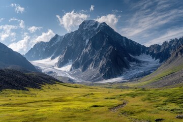 Fototapeta premium Scenic highland views in Kazakhstan feature moraines green meadows and impressive mountains with a glacier