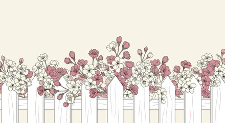 Floral Display Above A White Picket Fence, A Charming and Elegant Design.