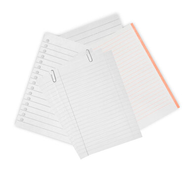 stack of lined paper sheets with paper clips on black