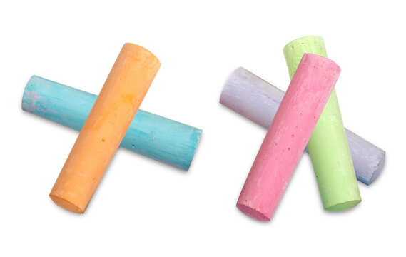 colorful chalk sticks crossed on a transparent background