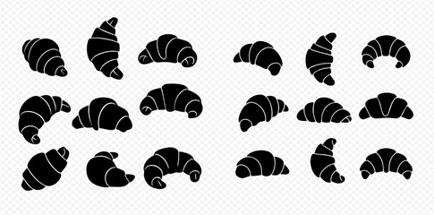 Collection of fifteen black silhouette croissant pastries arranged on a transparent background.