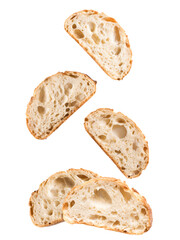 slices of bread falling on a black backdrop