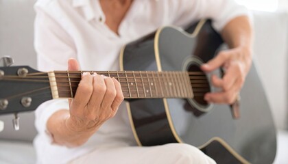 A scene where he plays the guitar while immersed in his emotions