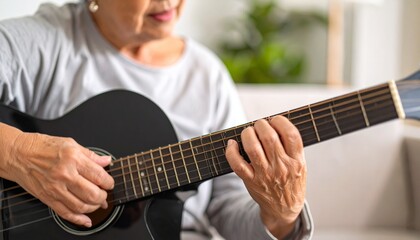 A scene where he plays the guitar while immersed in his emotions