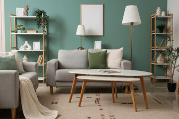 Interior of stylish living room with lamps, grey sofas and shelf units