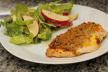Plated Meal of Chicken Cutlet and Lettuce Salad with Apple