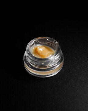Close up purple milk hash rosin marijuana cannabis concentrate dab