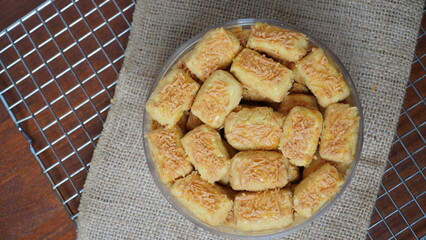 A close-up photo of traditional Indonesian cheese cookies (kastengel) 