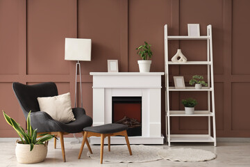 Fototapeta premium Interior of stylish living room with lamp, fireplace and armchair
