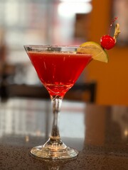 red cocktail on the table