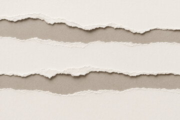 Torn paper texture creates visually appealing composition with layers of white and beige tones, evoking sense of creativity and artistic expression