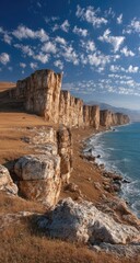 Coastal Cliffs and Cloudy Skies
