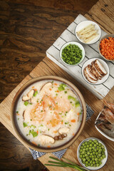 Delicious Shrimp Shiitake Mushroom Congee Asian Rice Porridge Bowl with Fresh Vegetables Healthy Seafood Meal