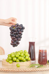 Fresh Purple and Green Grapes with Grape Juice Still Life on White Background