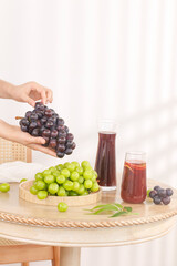 Fresh Grape Juice with Purple and Green Grapes Summer Drink Scene