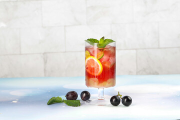 Fresh Grape Juice Cocktail with Mint and Ice - Summer Refreshing Drink on White Background