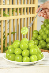 Fresh Green Seedless Grapes on Plate with Fork - Healthy Fruit Snack