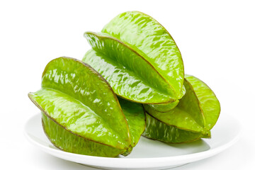 Fresh Green Star Fruit Slices from Fujian Zhangzhou China on White Plate Sweet Tropical Fruit