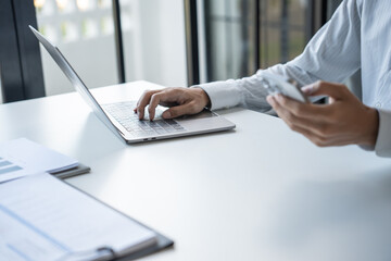 Successful Businessman Using Smartphone During Office Work