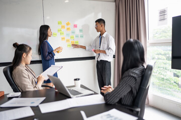 Business asian People Meeting Design Ideas collaboration Professional team brainstorming  for project  working together colleagues investor Group asian employees talking in boardroom