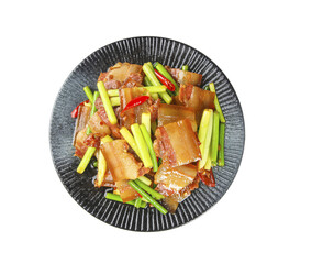 Wood-Fired Smoked Bacon Dish with Garlic and Scallions on Black Plate