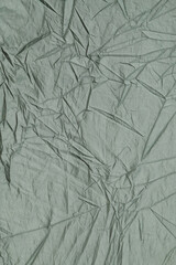 Grey polyester tent fabric pattern and texture background wrinkled and wrinkled. For graphic...